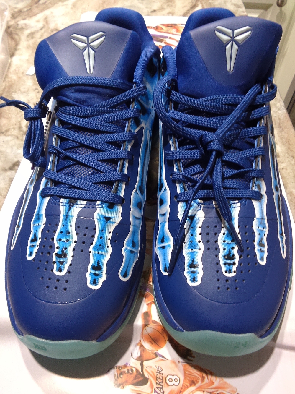 Nike Kobe Men’s Blue Basketball Shoes with Skeleton Graphics